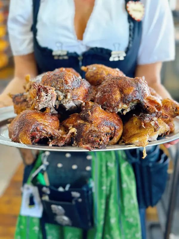 Freshly roasted ducks on a serving platter